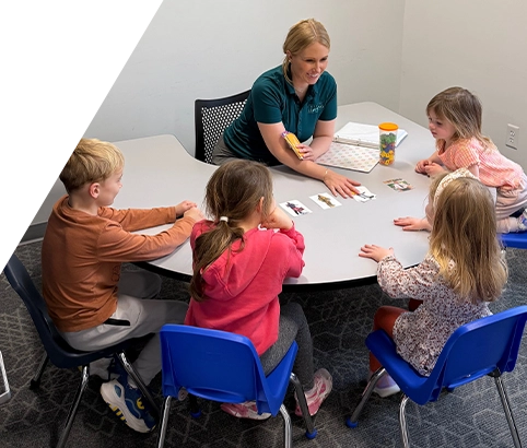 Therapist with a child performing ACT therapy